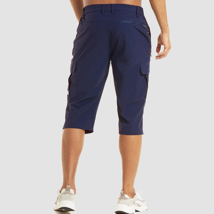 Side view: Men's multi-pocket cargo shorts, knee-length, showcasing utility for summer outdoor activities.