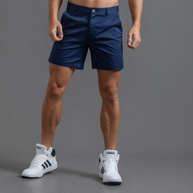 Comfortable & stylish men's knee-length chino shorts, ideal for summer apparel.