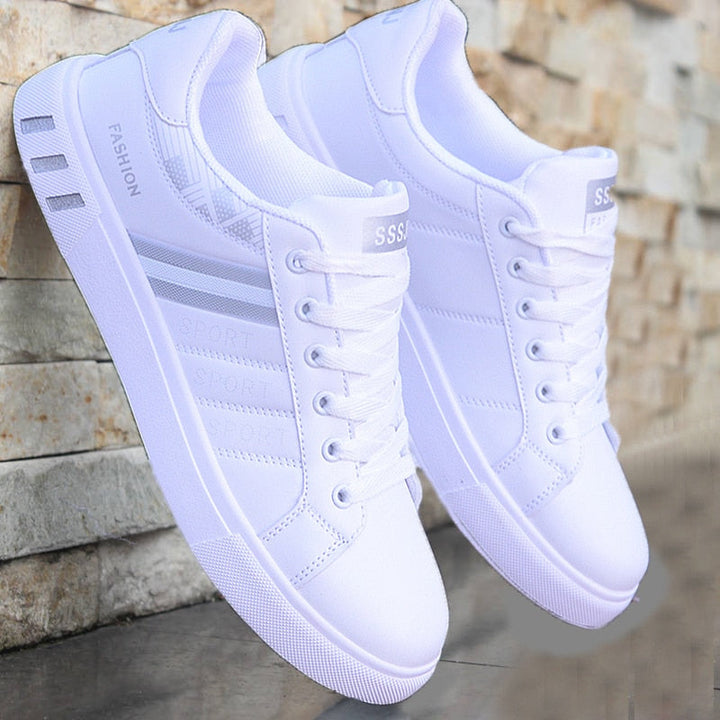 Stylish men's casual low-top lace-up sneakers, ideal comfortable footwear for versatile spring and summer outfits.