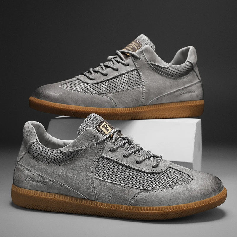 Stylish men's casual low top sneakers featuring a breathable, lace-up design. Perfect for everyday comfort and modern style.