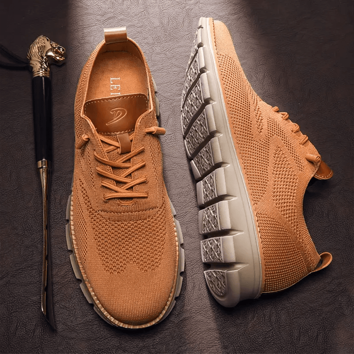 Classic men's lace-up sneakers in a versatile design. Comfortable breathable footwear for any season.