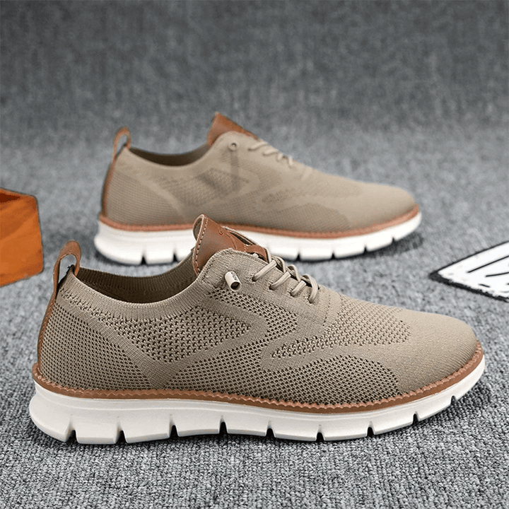 Lightweight men's breathable sneakers, offering comfort & style. Perfect lace-up casual shoes.