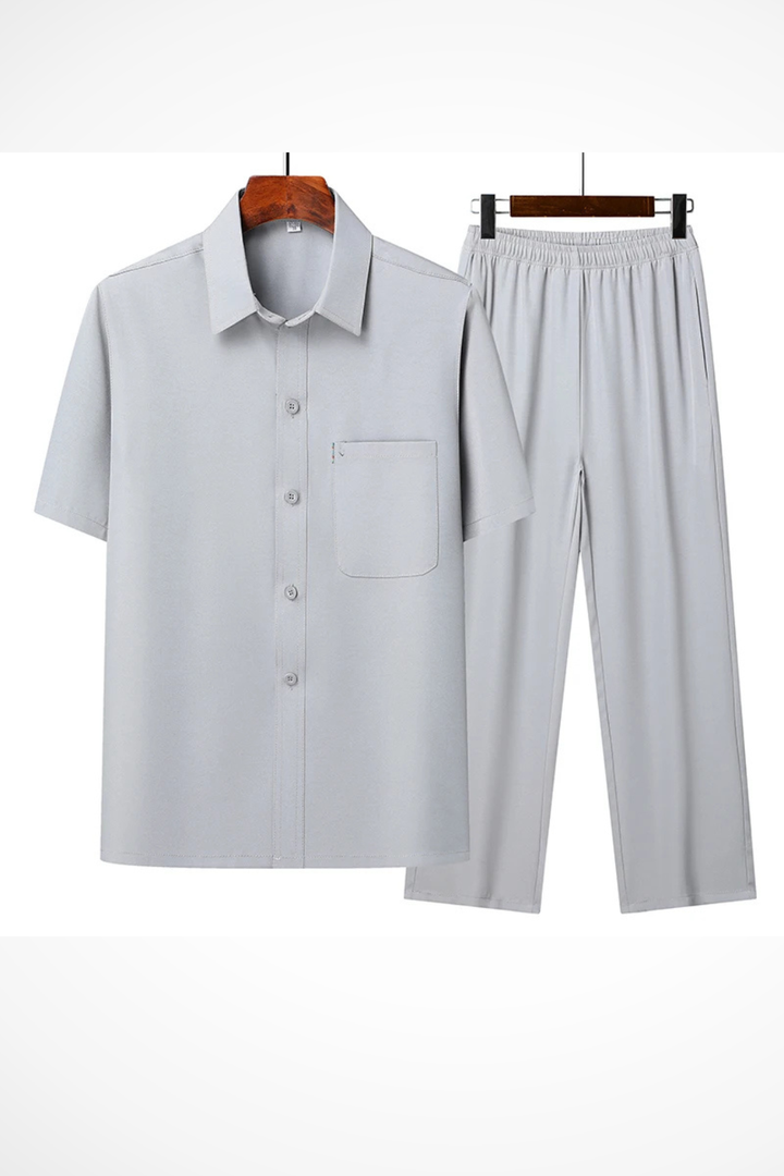 Stylish men's short sleeve lapel shirt and elastic waist trousers. Comfortable two-piece summer outfit.