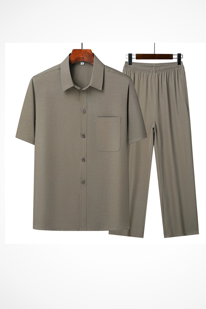 Fashionable men's casual two-piece set with a lapel shirt and comfortable elastic waist trousers.