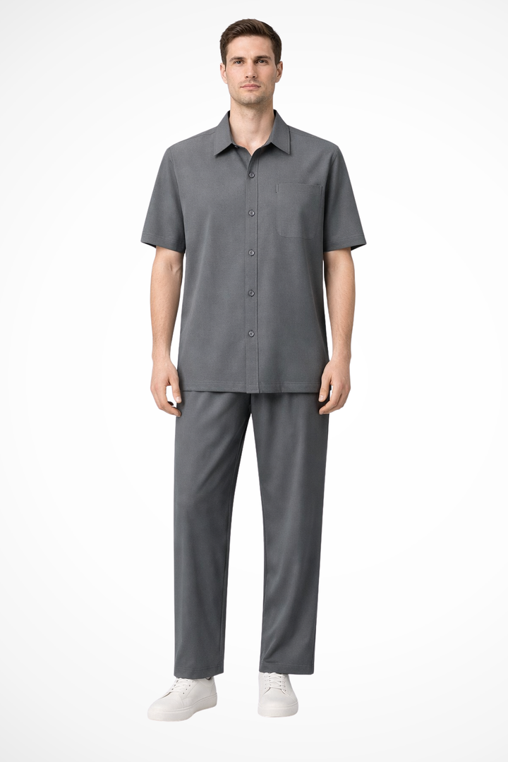 Men's summer outfit featuring a short sleeve lapel shirt and elastic waist trousers. Relaxed & stylish.