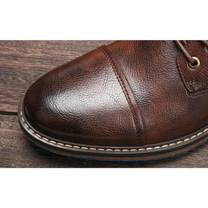 Comfortable men's leather lace-up ankle boots, oxford style for versatile daily wear.