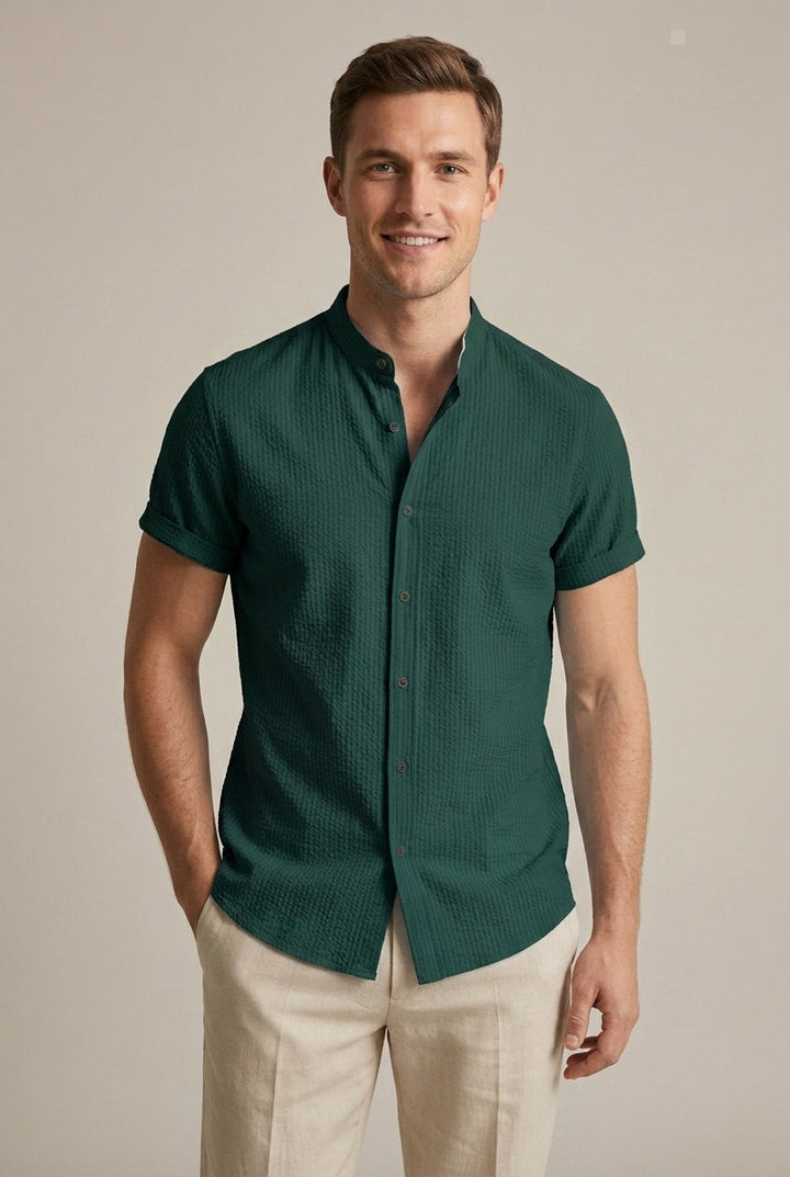Comfortable men's loose fit light blue seersucker short sleeve shirt, band collar, perfect for summer fashion.