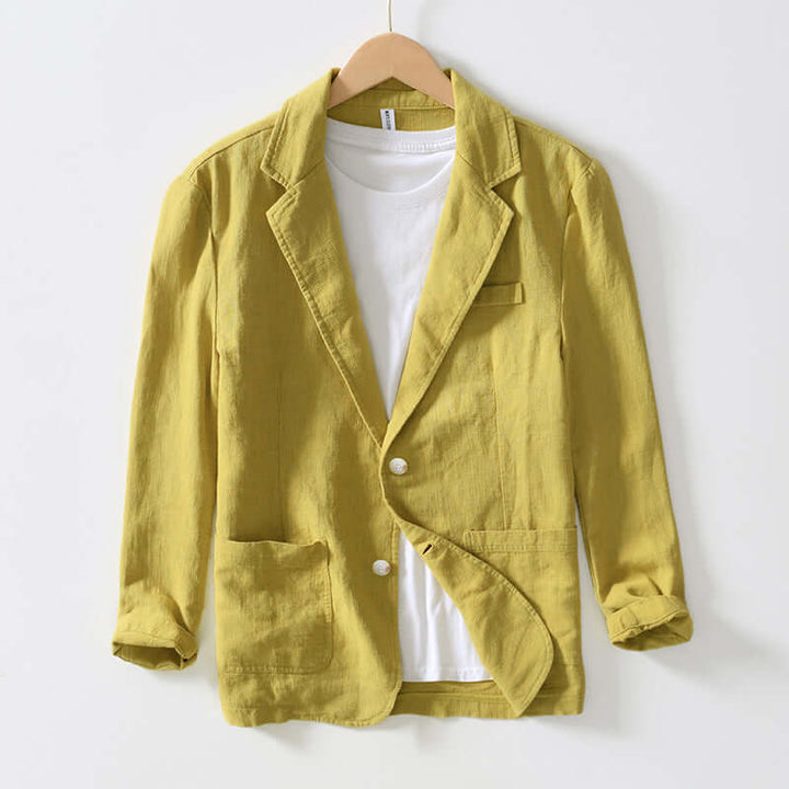 Man wearing a stylish lightweight all-season men's blazer jacket. Perfect for business casual & modern fashion.