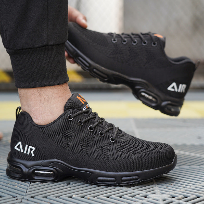 New men's protective footwear; lightweight black safety shoes, steel toe, slip-resistant for jobsite comfort.