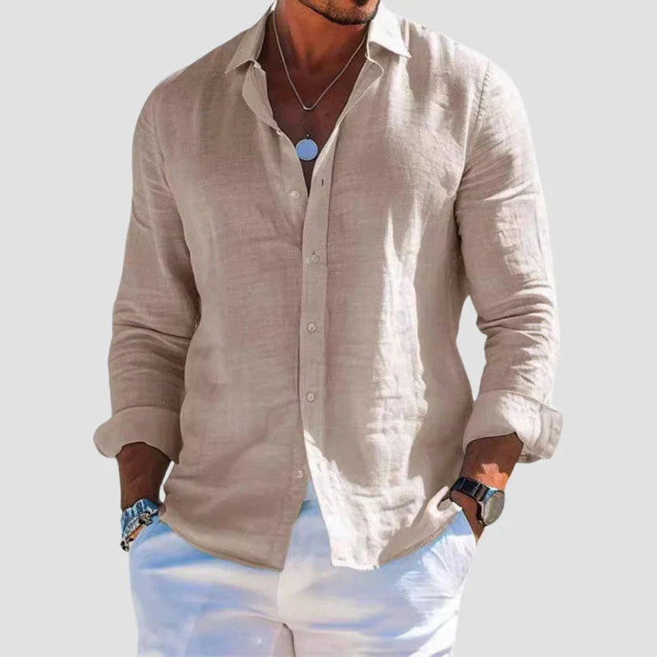 Stylish men's green long sleeve button-down shirt for casual comfort. A versatile top for men's everyday fashion.