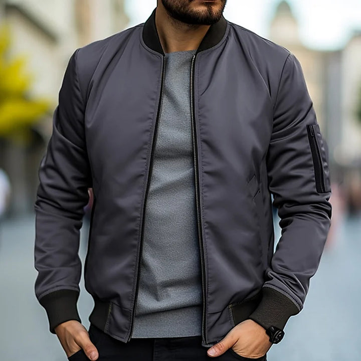Men's lightweight bomber jacket in classic navy, perfect for casual spring or autumn outerwear. Versatile menswear.