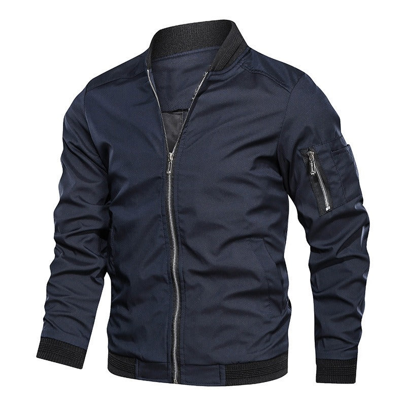 Close-up of men's lightweight bomber jacket, highlighting secure zip pockets, ribbed cuffs, and collar details.