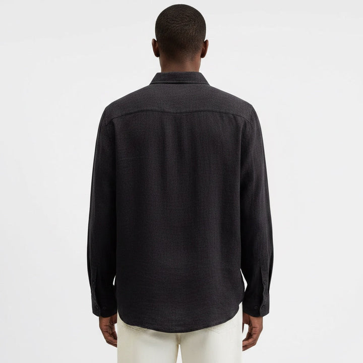 Fashionable men's button-up shirt, a versatile choice for summer. Breathable & comfortable.