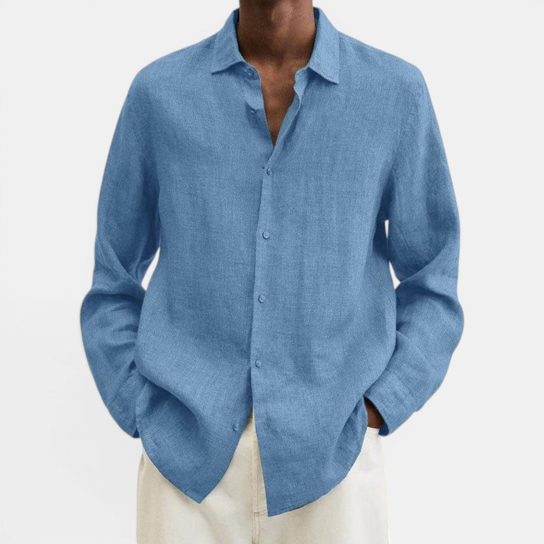 Stylish men's button-up shirt, perfect for summer fashion. Breathable fabric ensures comfort.