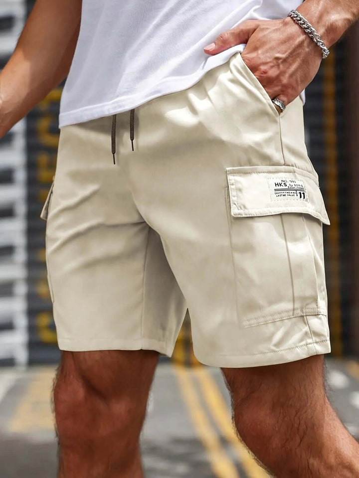 Men's casual lightweight cargo shorts with elastic waist and multiple pockets for convenient storage.