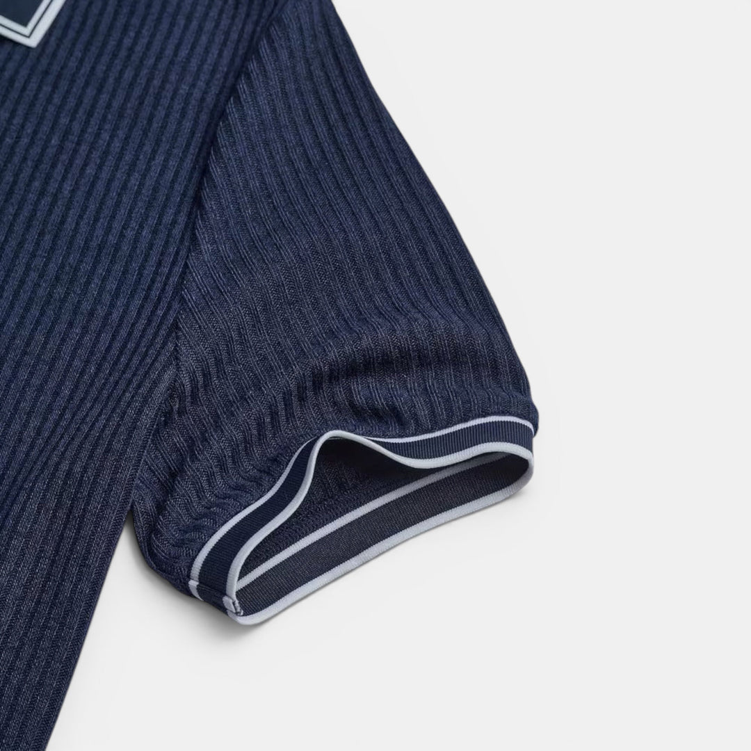 Classic men's short-sleeve cotton polo, a smart casual staple for warmer days.