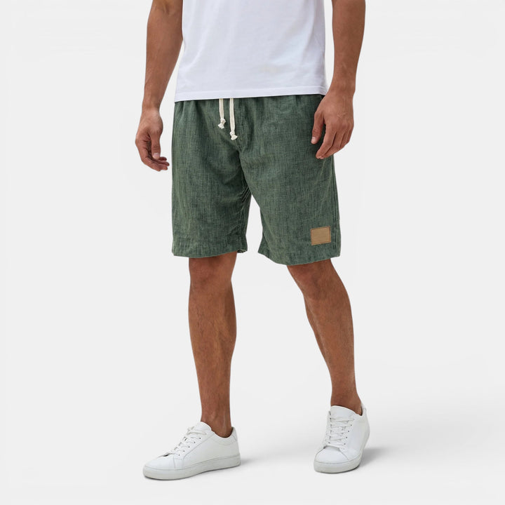 Relaxed fit men's travel shorts, lightweight and breathable with a practical drawstring.