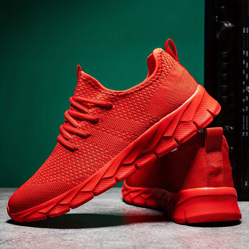 Soft knitted men's running shoes, lightweight & comfortable athletic footwear for sporty active wear.