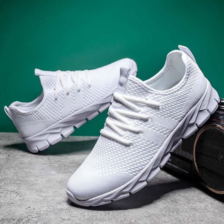 Side view: Men's lightweight knitted running shoes, comfortable athletic footwear with sporty style for active wear.
