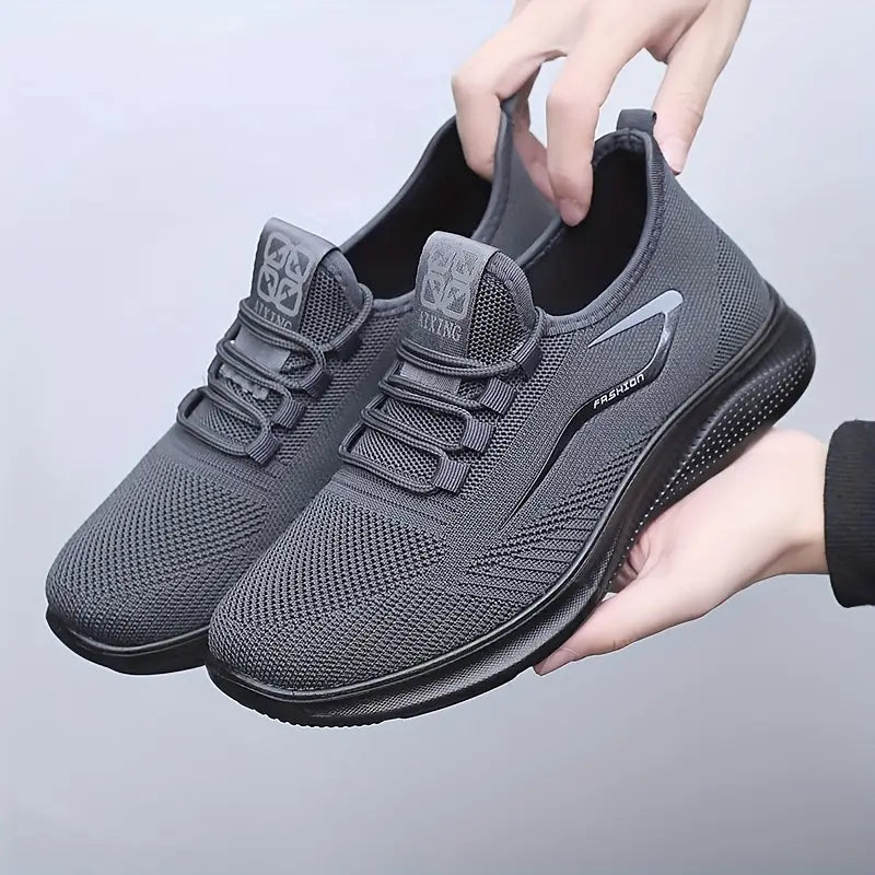 Men's lightweight lace-up casual sneakers in minimalist design, perfect for all-day comfort and everyday wear.
