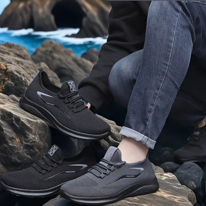 Comfortable men's walking sneakers with lace-up closure, ideal for athletic activities and daily casual wear.