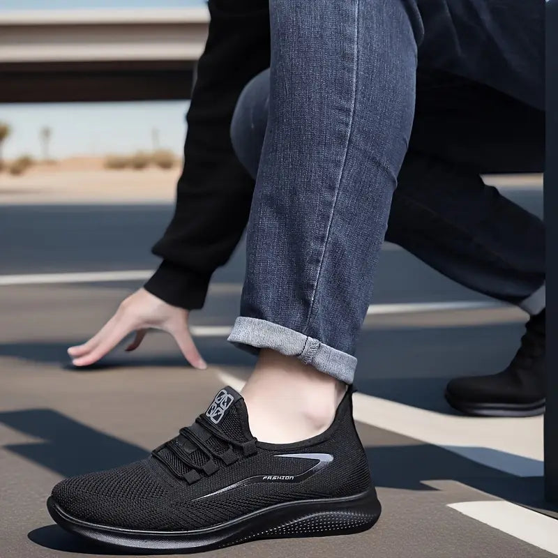 Lightweight men's casual sneakers with secure lace-up design, offering all-day comfort for walking and everyday activities.