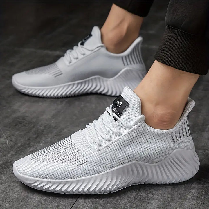 Modern men's fashion sneakers, lightweight & breathable with secure lace-up closure. Great for everyday comfort.
