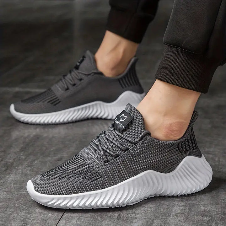 Durable men's running sneakers: lightweight design, comfortable fit, and supportive sculpted sole. Lace-up for style.