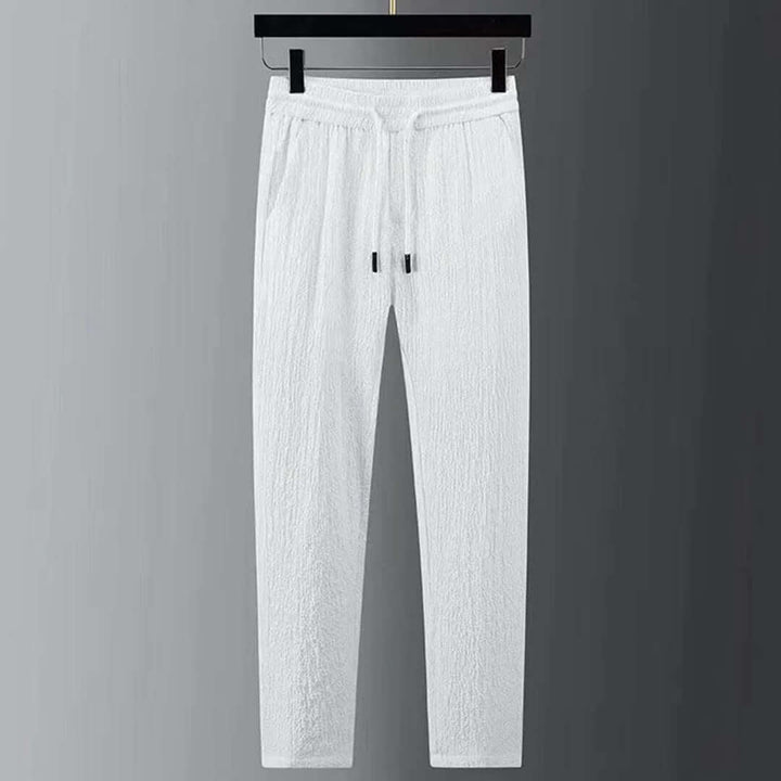 Casual men's lightweight summer fashion set, offering a modern look and comfort for sunny days and travel.