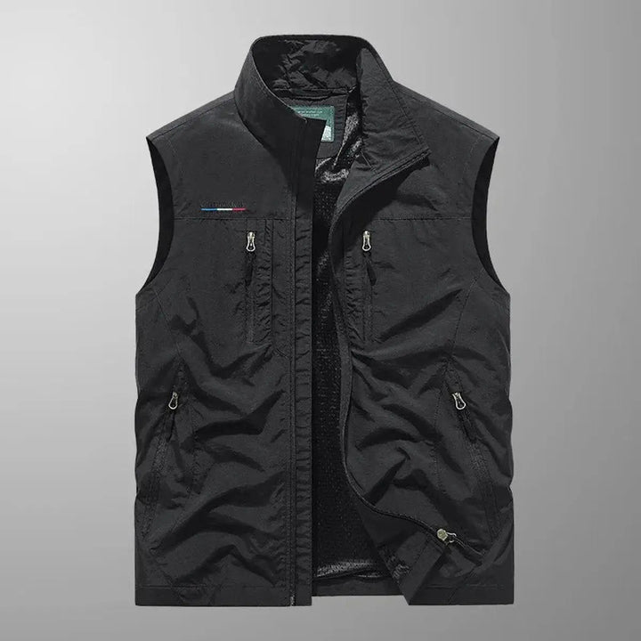 Utility men's outdoor vest with numerous pockets, ideal for fishing, photography, or carrying hiking gear. Water-resistant.