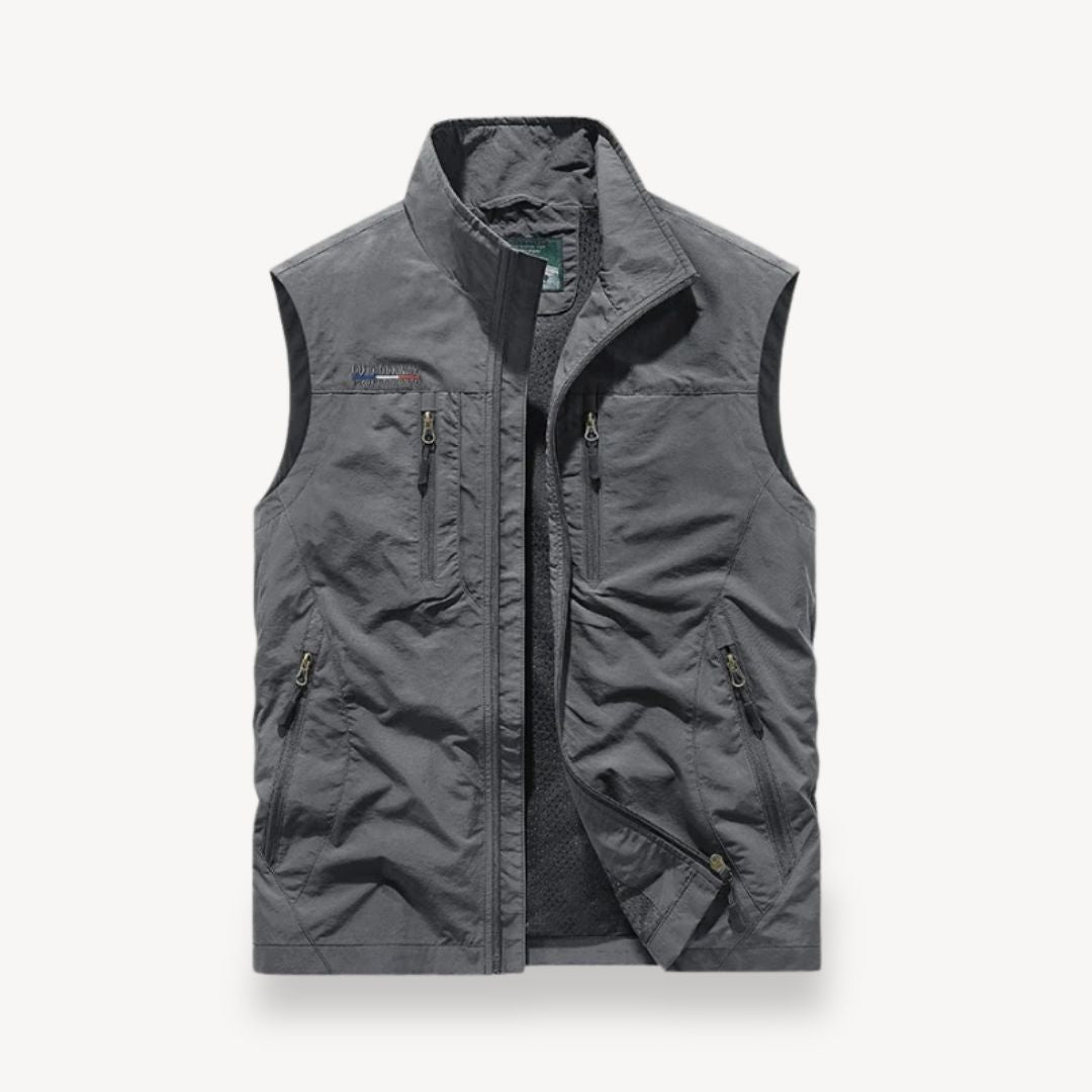Khaki men's multi-pocket vest jacket for summer outdoor activities. Lightweight, sleeveless, perfect for travel.