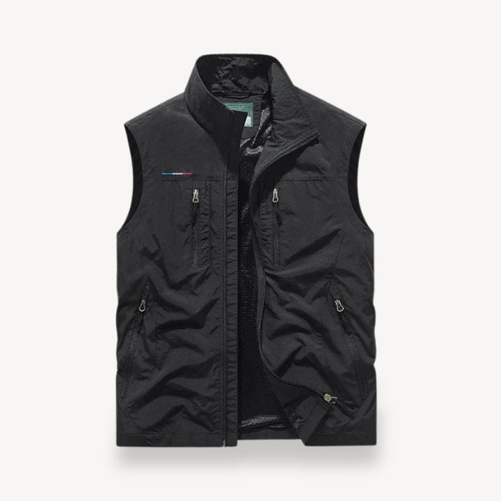Casual men's lightweight summer vest jacket. Durable fabric, multiple secure pockets. Great for layering & outdoor use.