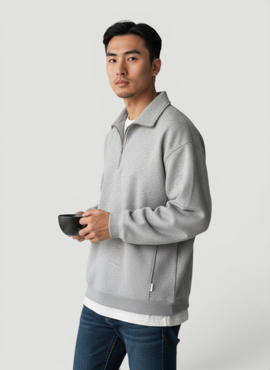 Soft textured men's long sleeve lightweight quarter zip pullover sweater, ideal for casual layering.