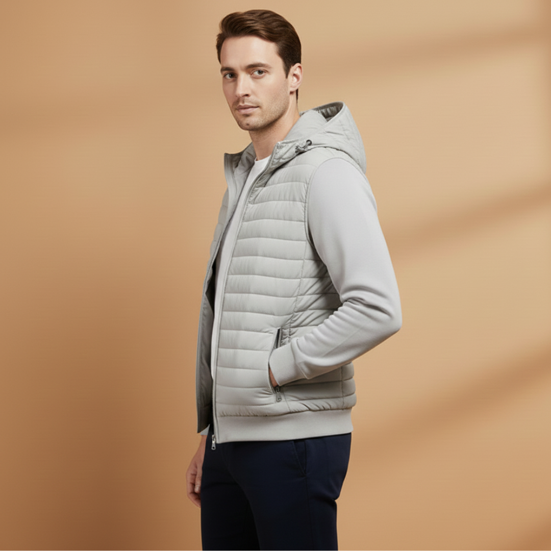 Close-up of a men's quilted jacket showing its lightweight fabric, stand collar, and durable full zip design.