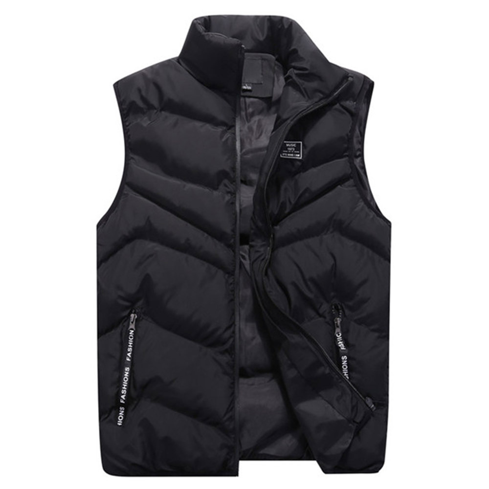 Stylish men's quilted puffer vest, perfect as a lightweight layering piece for fall fashion. Warm outerwear with a casual look.