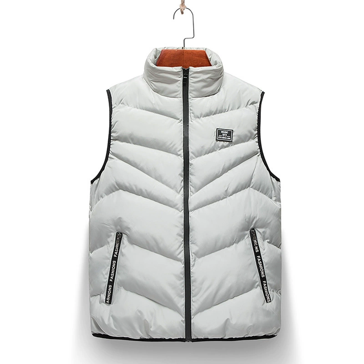 Modern men's quilted puffer vest, a lightweight sleeveless jacket. Provides warmth and style for fall & winter layering.