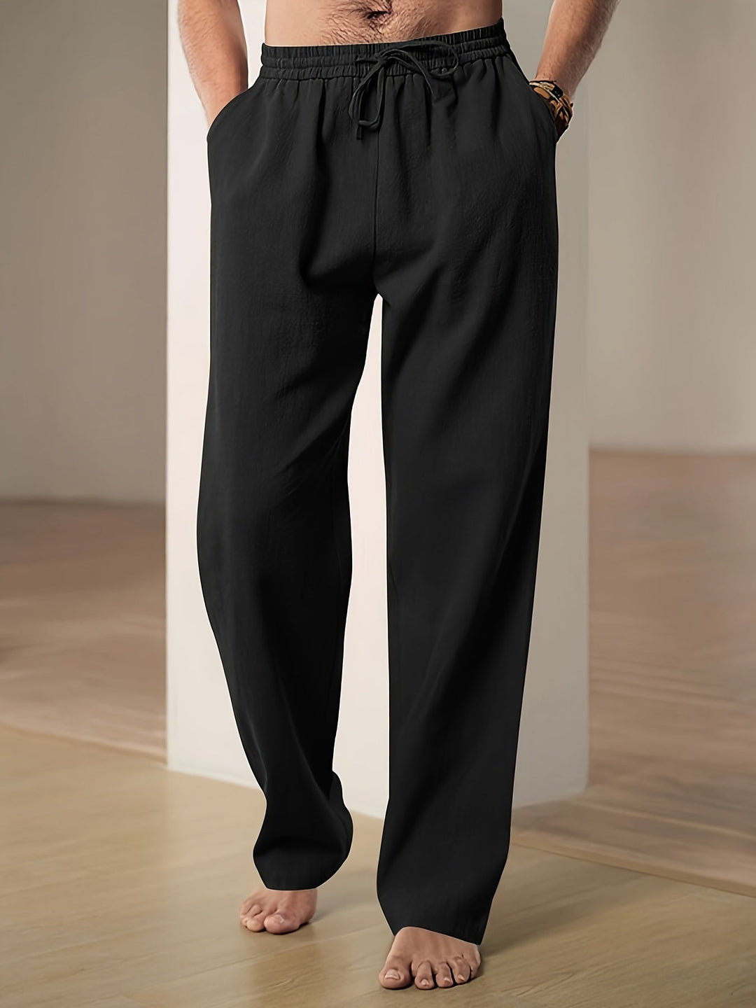 Men's lightweight relaxed fit lounge trousers with drawstring waist for ultimate casual comfort.
