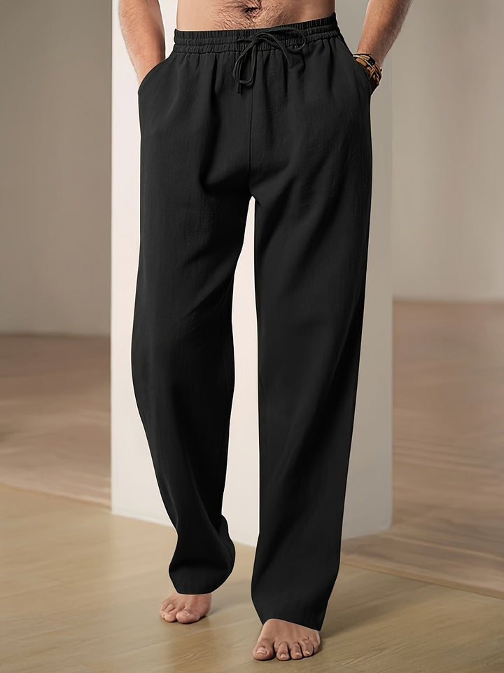 Men's lightweight relaxed fit lounge trousers with drawstring waist for ultimate casual comfort.