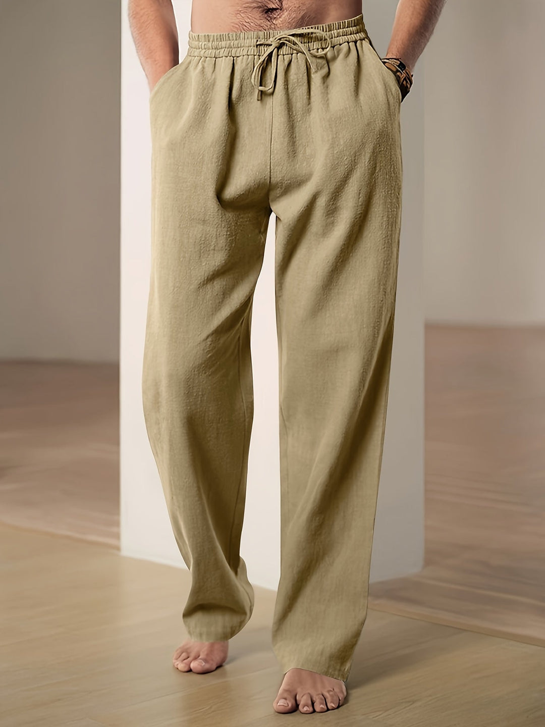 Men's relaxed fit joggers with drawstring waist. Lightweight comfort pants for lounging or casual wear.