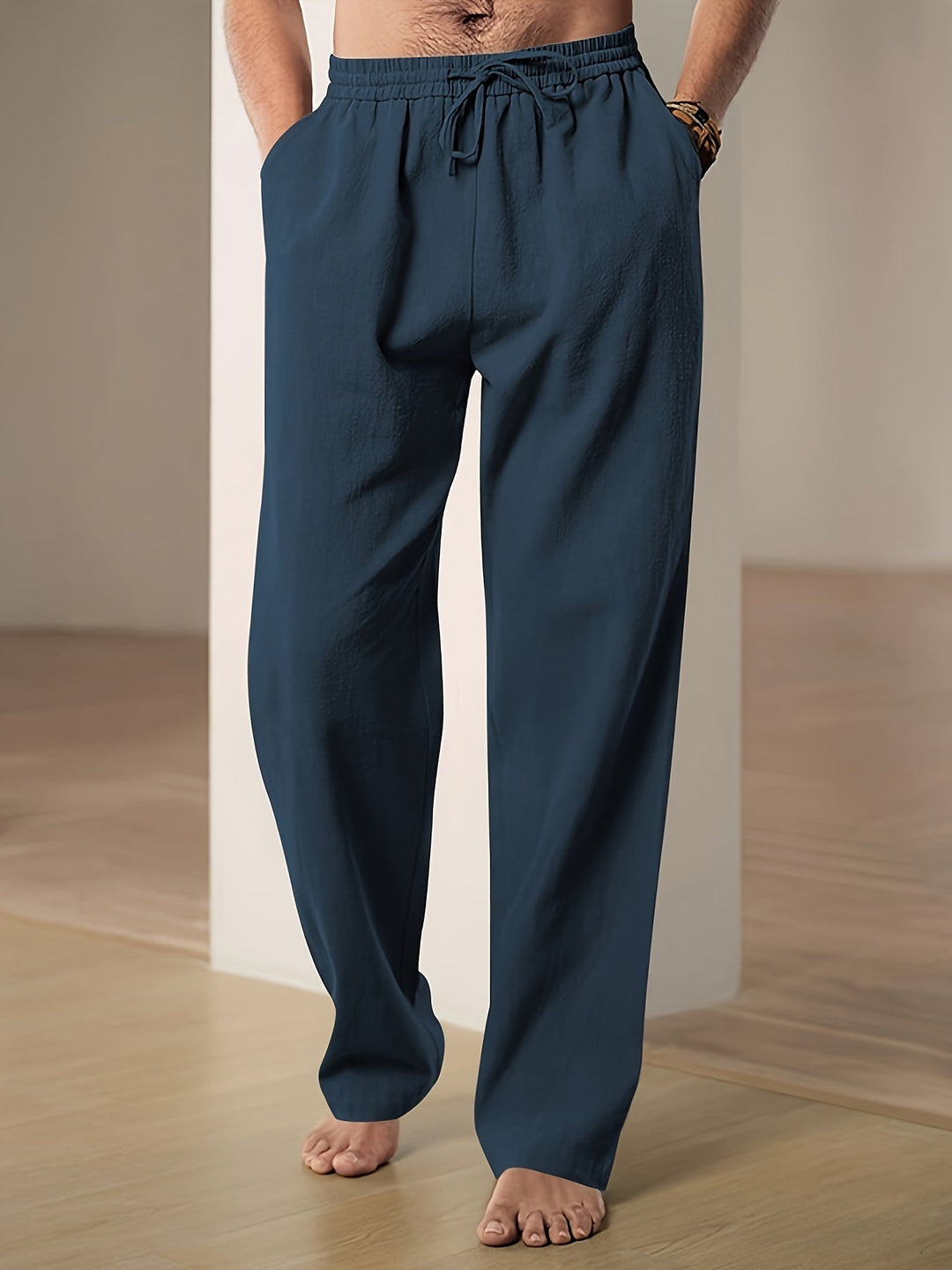 Drawstring waist lightweight men's lounge trousers offering a relaxed fit & ultimate comfort for daily wear.