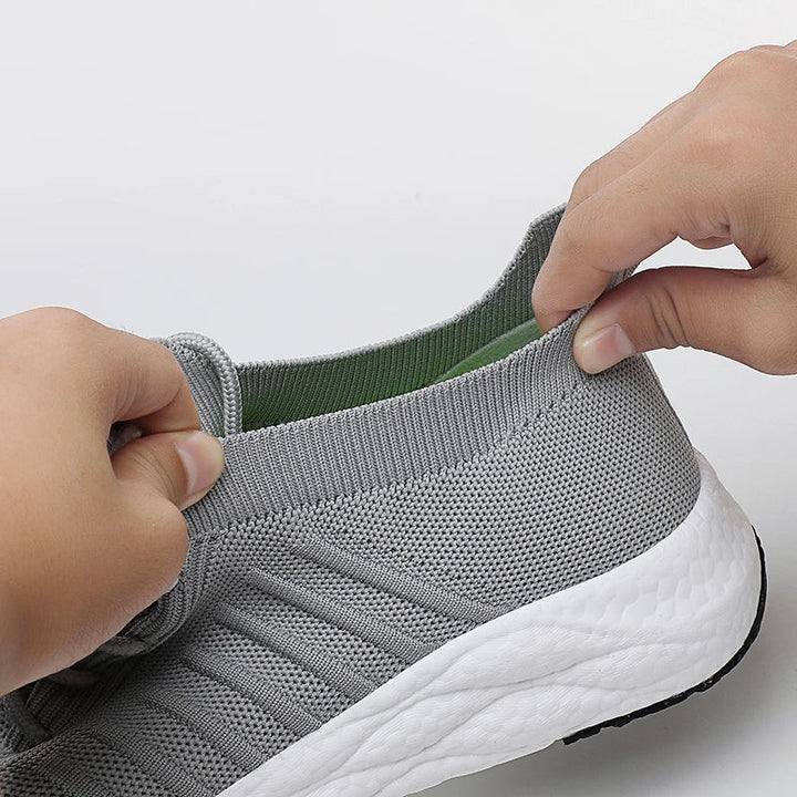 White men's casual sneakers with a focus on comfort and breathability.