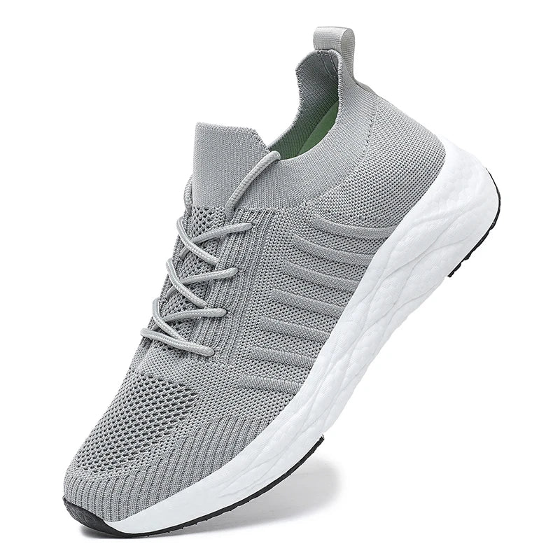 Dynamic shot of men's sport shoes in motion, highlighting lightweight design.