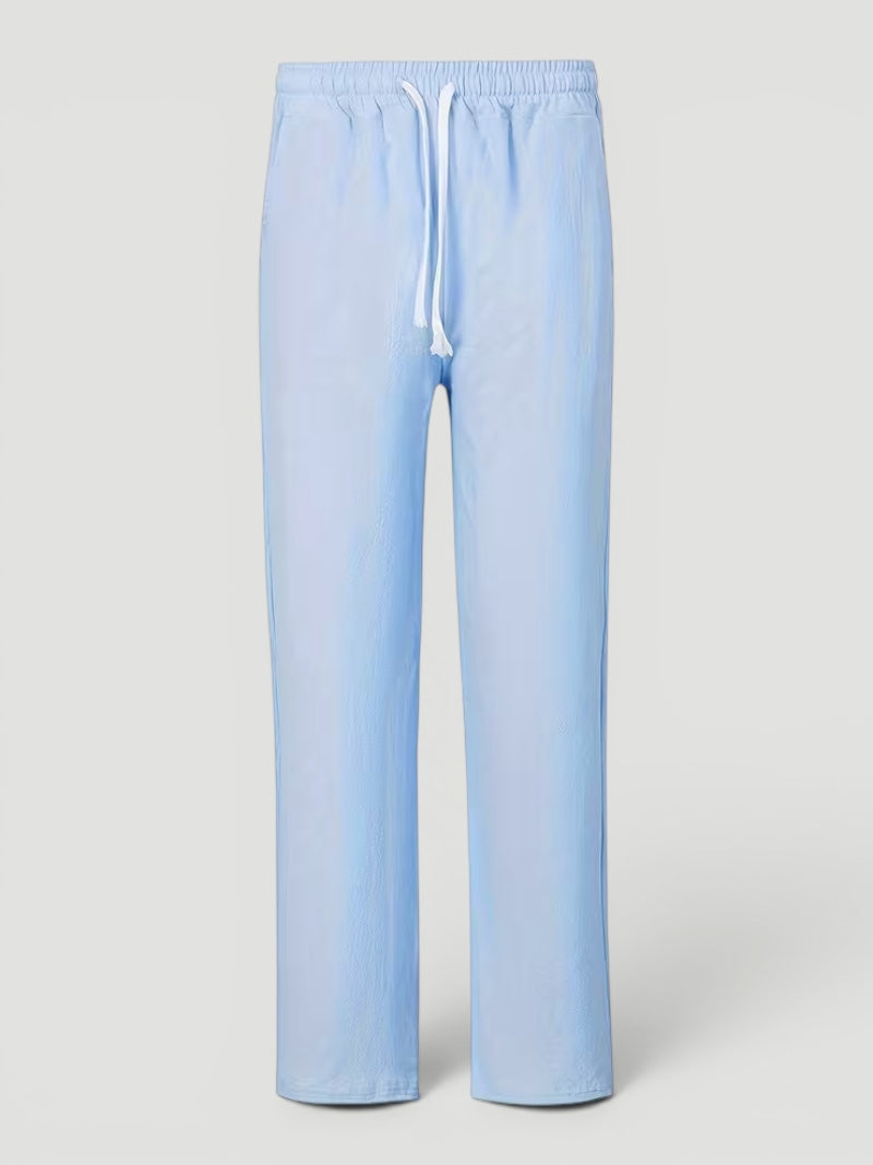 Close-up of pocket detail on men's lightweight straight leg pants, stylish & practical design.