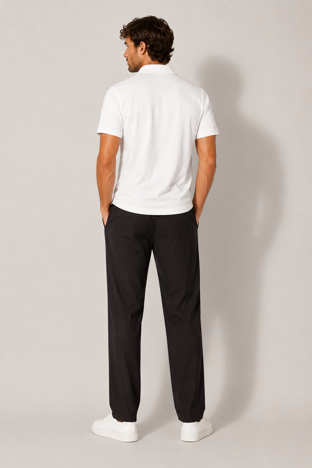 Close-up of drawstring waist on men's lightweight straight leg pants, comfortable casual trousers.