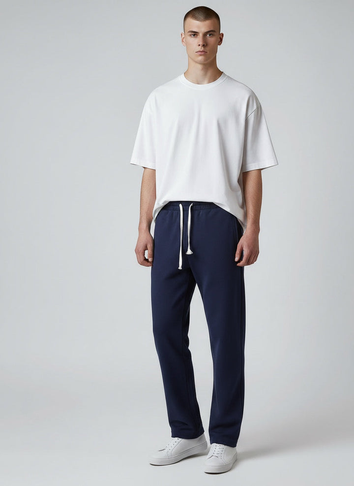 Man wearing casual straight leg lightweight pants, perfect for spring/fall everyday fashion & comfort.