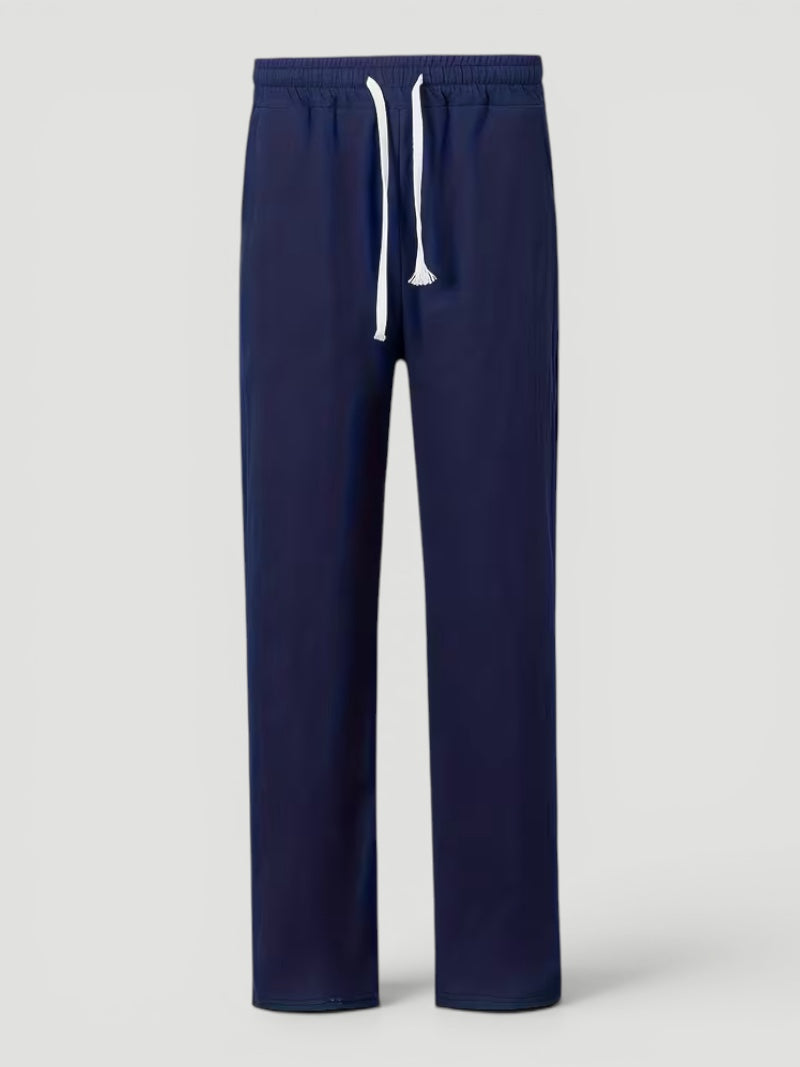 Man enjoying outdoor activity in comfortable lightweight straight leg casual trousers.