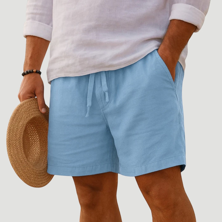 Blue men's lightweight shorts featuring a relaxed fit, essential for summer comfort.