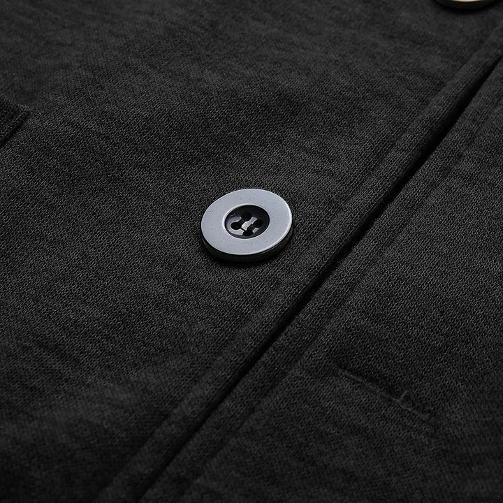 Everyday men's blazer: lightweight, versatile, and features well-placed pockets for utility and style.