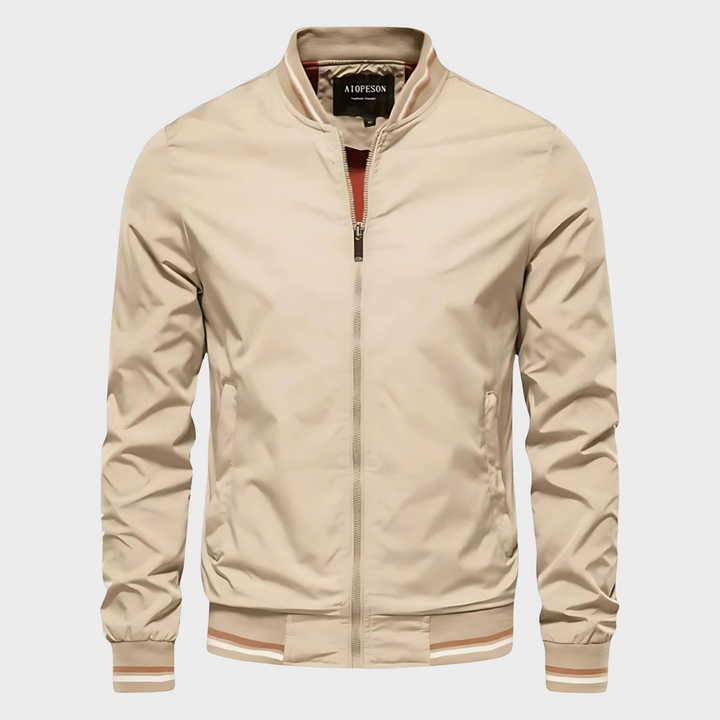 Stay dry & comfortable in this men's lightweight water-resistant windbreaker. Full-zip for spring/summer outerwear.