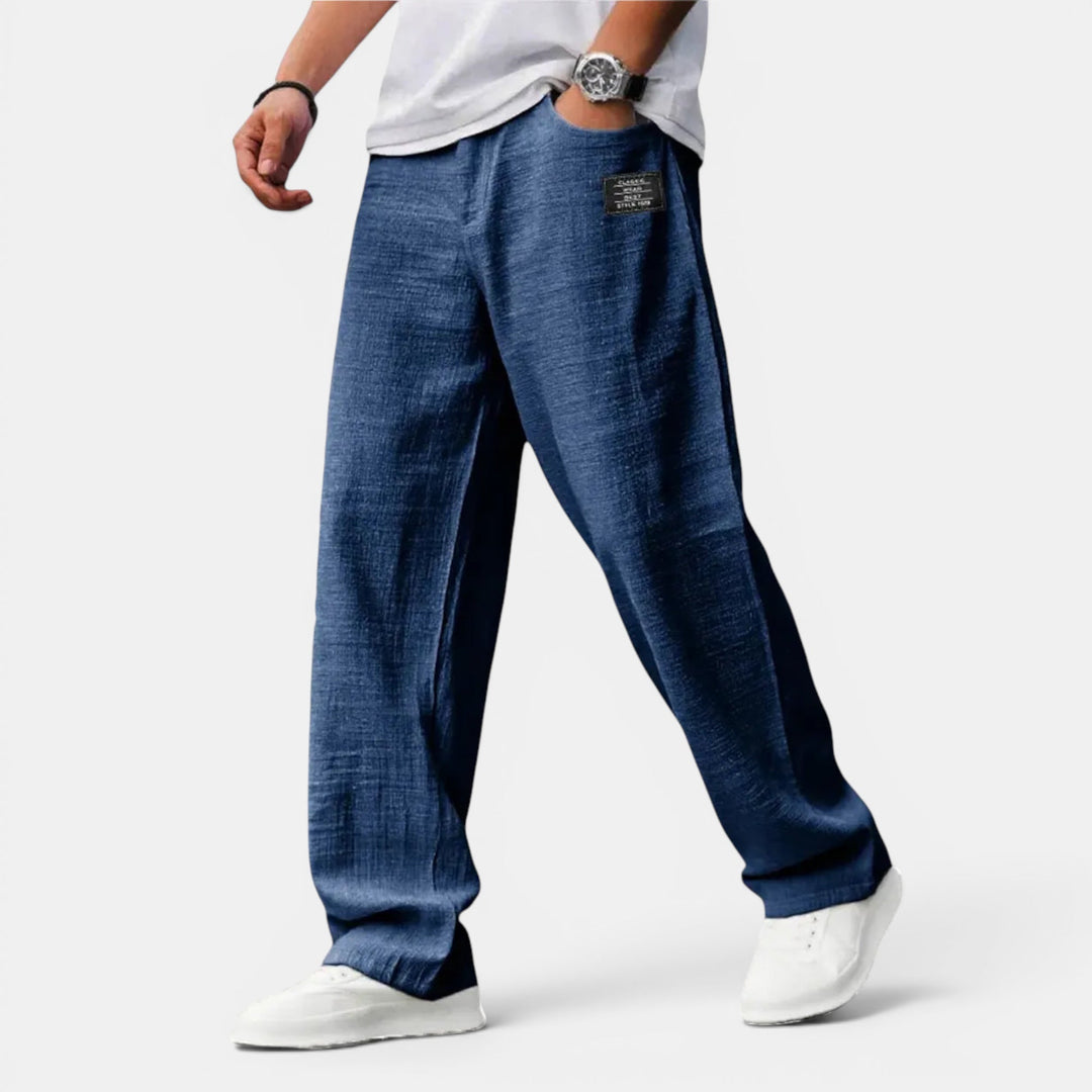 Stylish men's wide leg drawstring pants for warm weather, offering everyday comfort & versatile fashion.